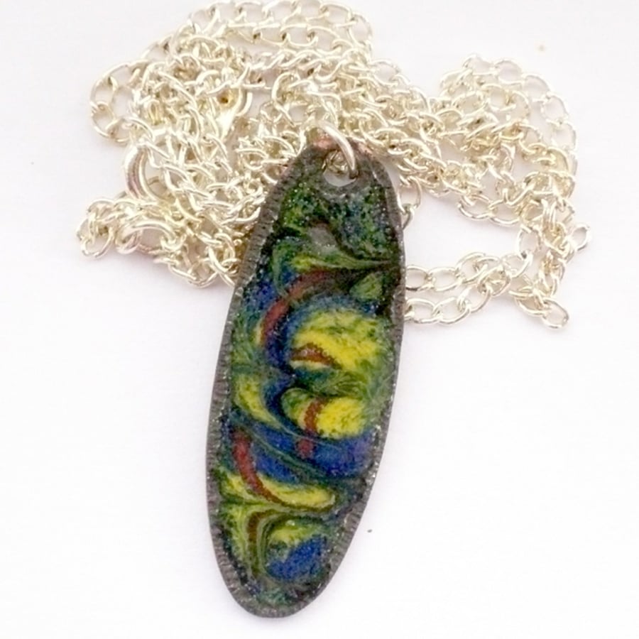 enamel pendant - oval, scrolled yellow and red-brown on blue