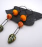 orange and green leaf ceramic earrings - Image 2