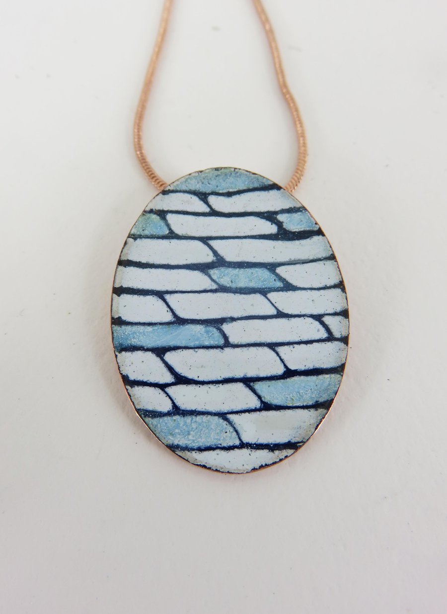 Oval Shaped Pendant in Blue and White Enamel with a Hand Drawn Pattern