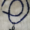 Haematite Crystal Ankh and Blue Polished Wooden African Beads Necklace