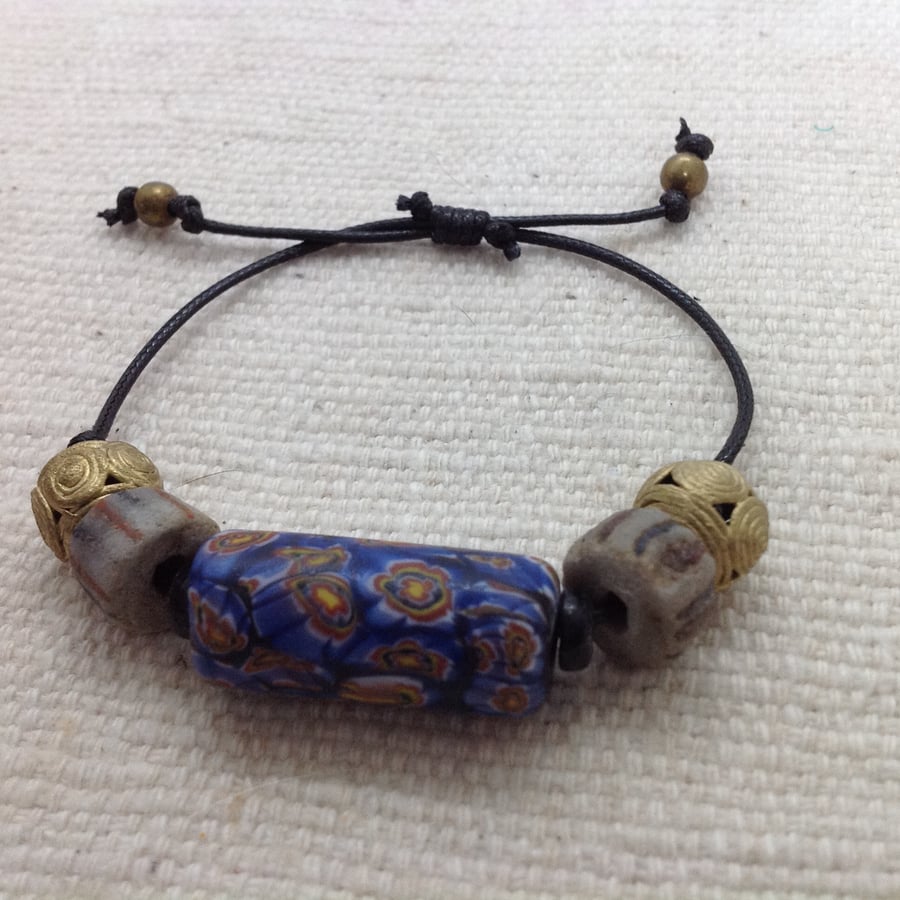 Unisex bracelet with a giant Himalayan bead plus old and new West African beads