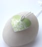 Heart necklace in lime green with dandelion seeds print