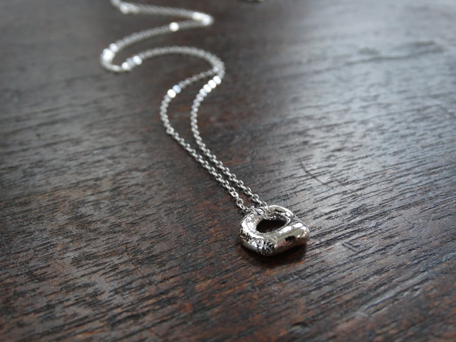 Artefact tiny charm pendant in recycled silver