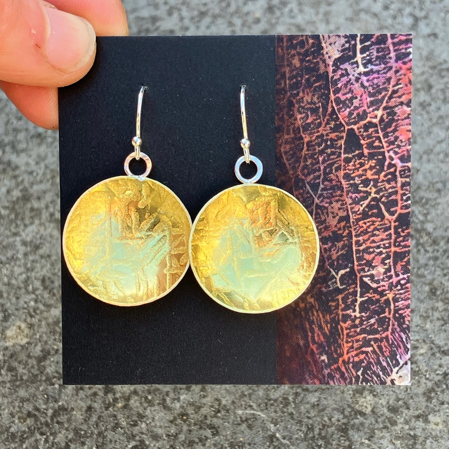 Brass bowl dangle earrings with sterling silver hooks.