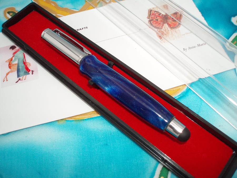 Telescopic Purse Pen in blue acrylic with chrome fittings.