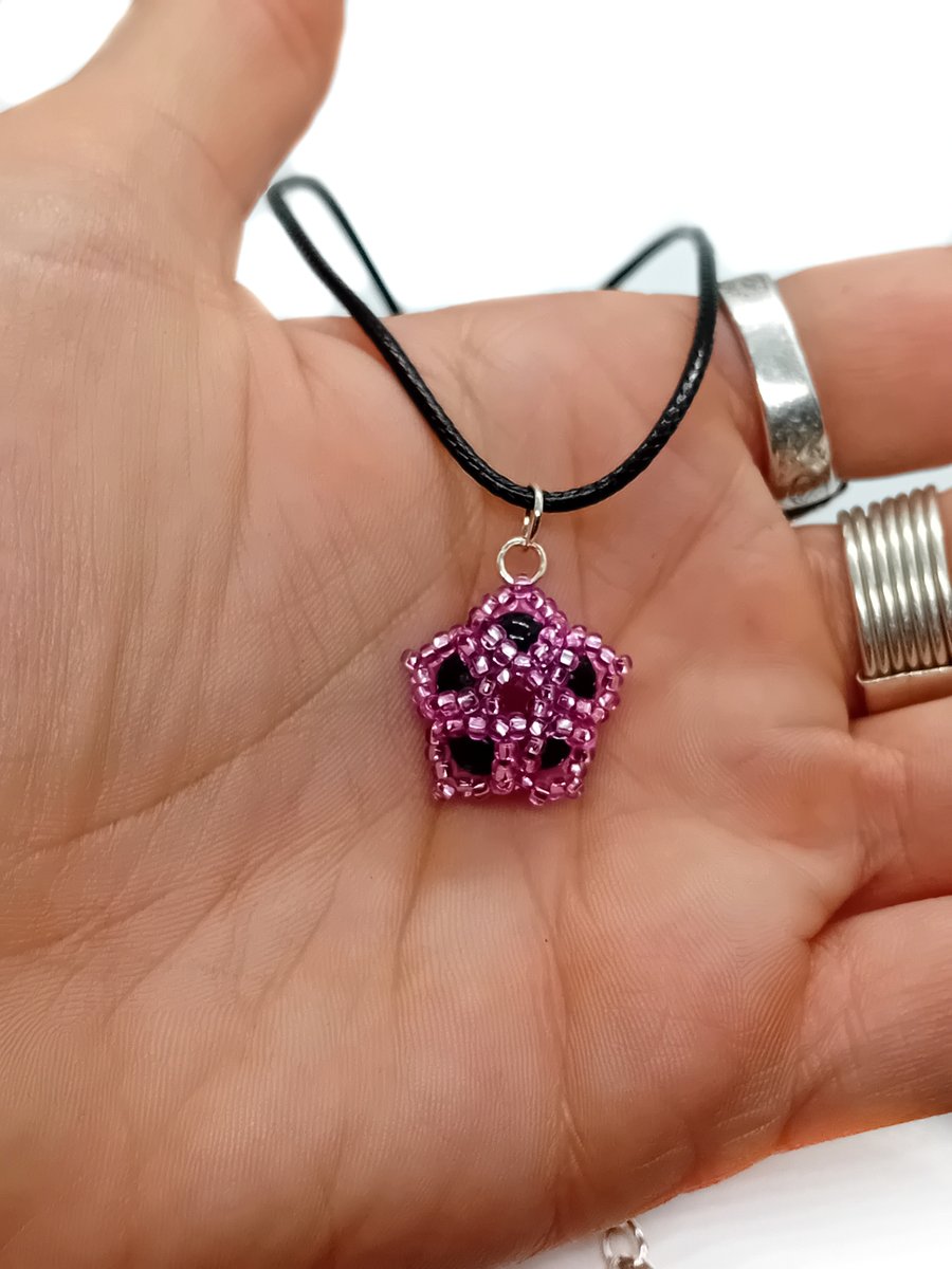Pink and black beaded flower pendant cord necklace