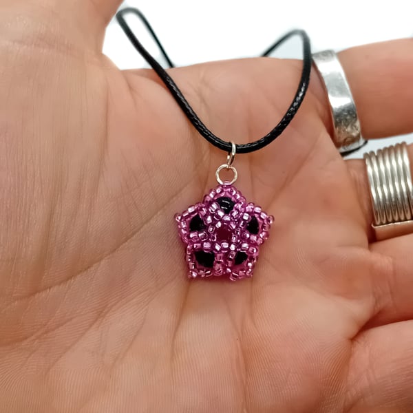 Pink and black beaded flower pendant cord necklace