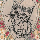 Cute kitten in a heart