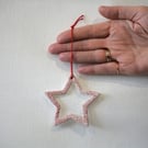 Star tree decoration with red speckled detail