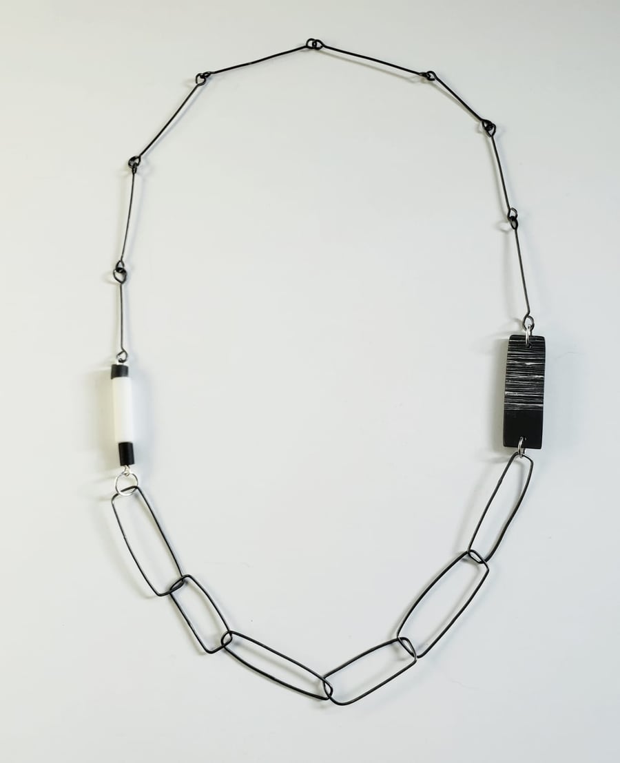 Unusual silver, black and white quirky chain necklace