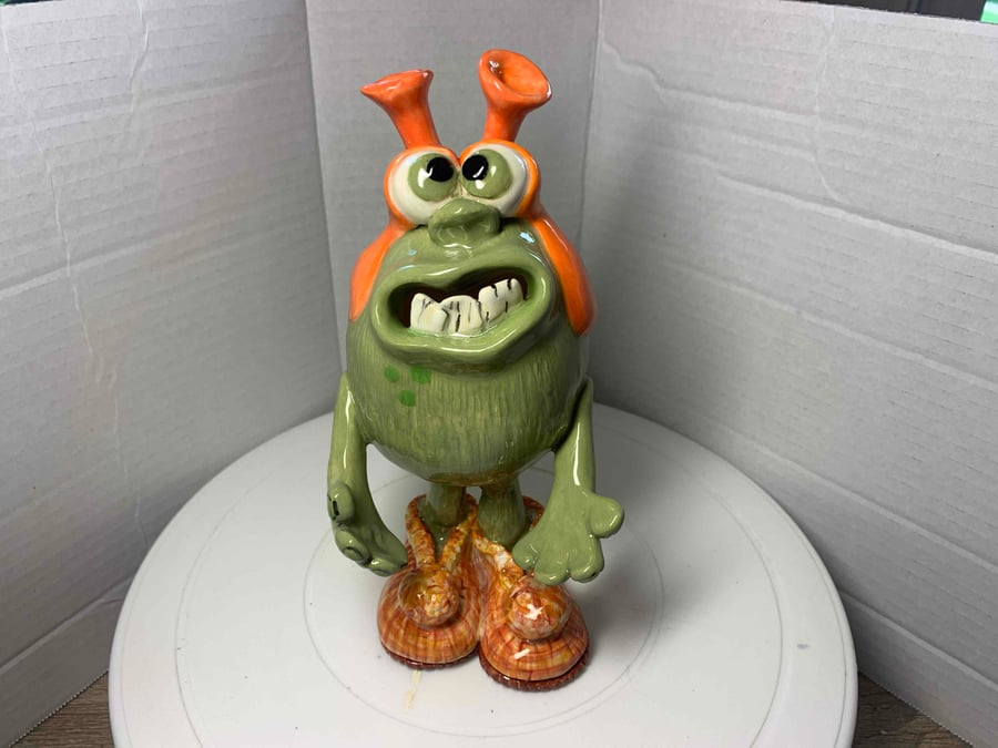 Quirky monster in grandad slippers