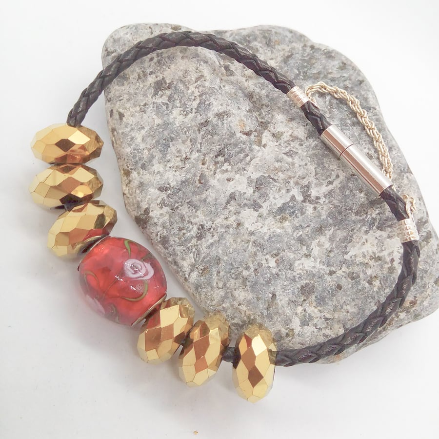 Red and Gold European Lampwork Bead Bracelet on a Black Plaited Leather Band