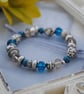 Silver and blue bead stretch bracelet - Image 3