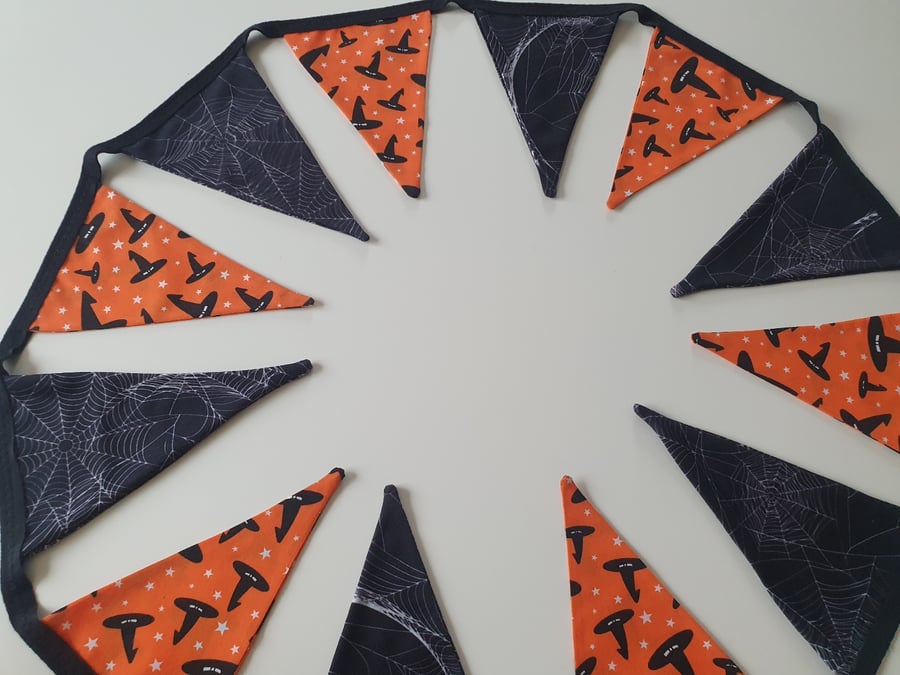 Spooky Cobweb and Orange Witches Hats Bunting on Black Binding