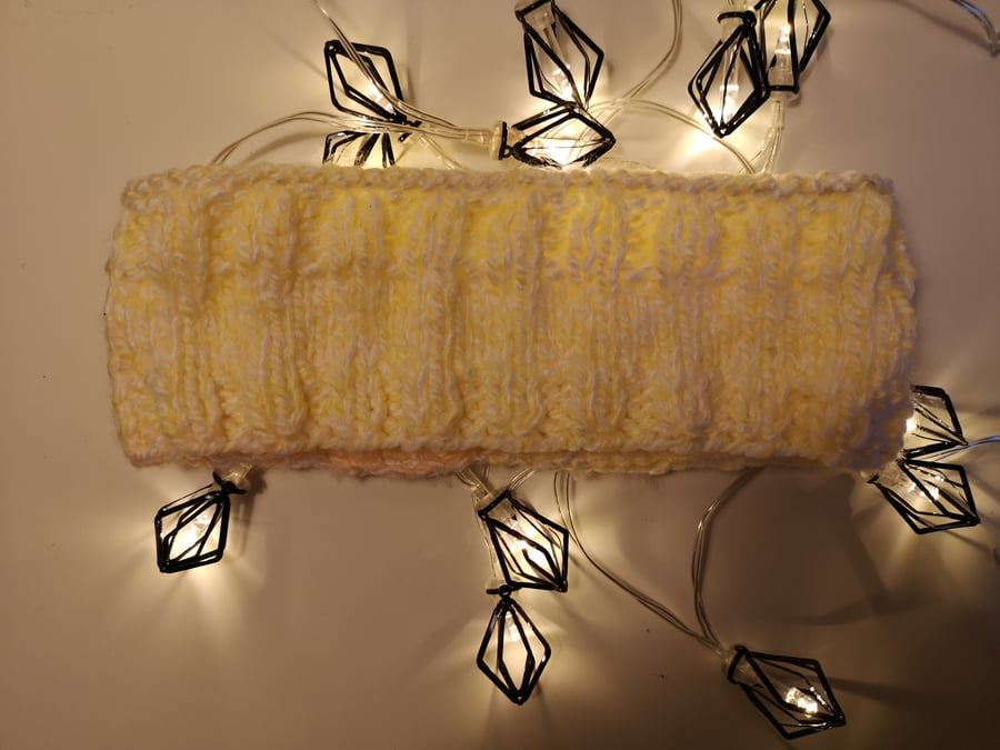Handknitted yellow earwarmer