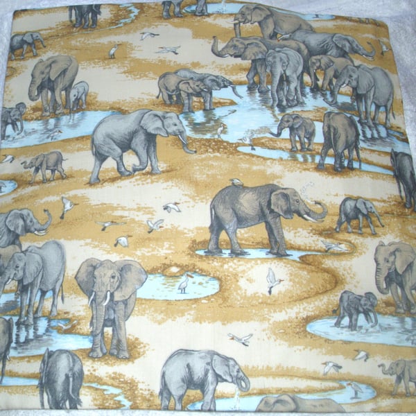 On Safari  Elephants at the waterhole cushion 