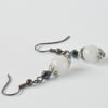 White jade and jet black crystal earrings