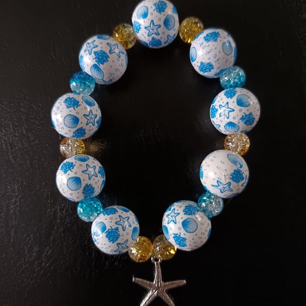 Elasticated chunky beaded nautical bracelet with starfish charm