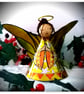 Large: Yellow Tin Angel Christmas tree topper - Image 1