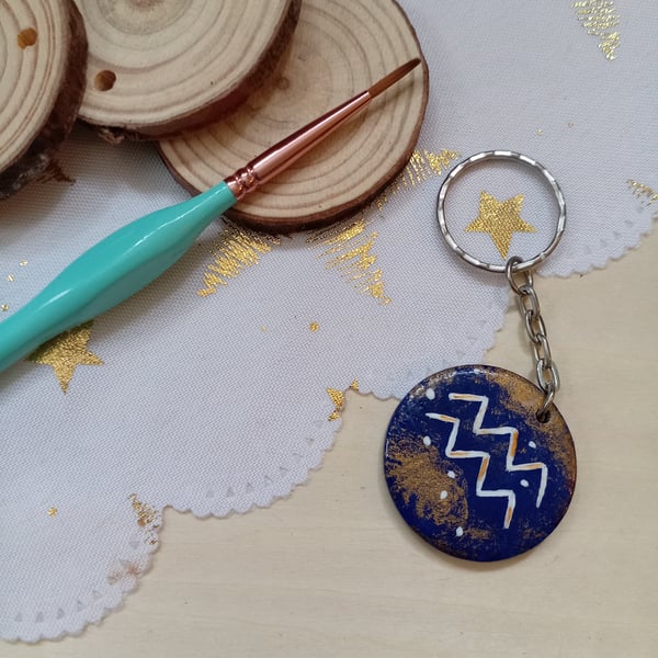 Wooden circular starsign aquarius Keyring