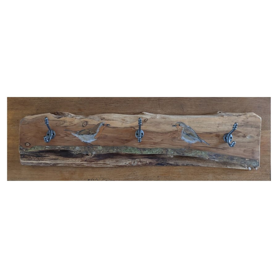 Large coat rack with cast iron hooks on reclaimed and repurposed yew