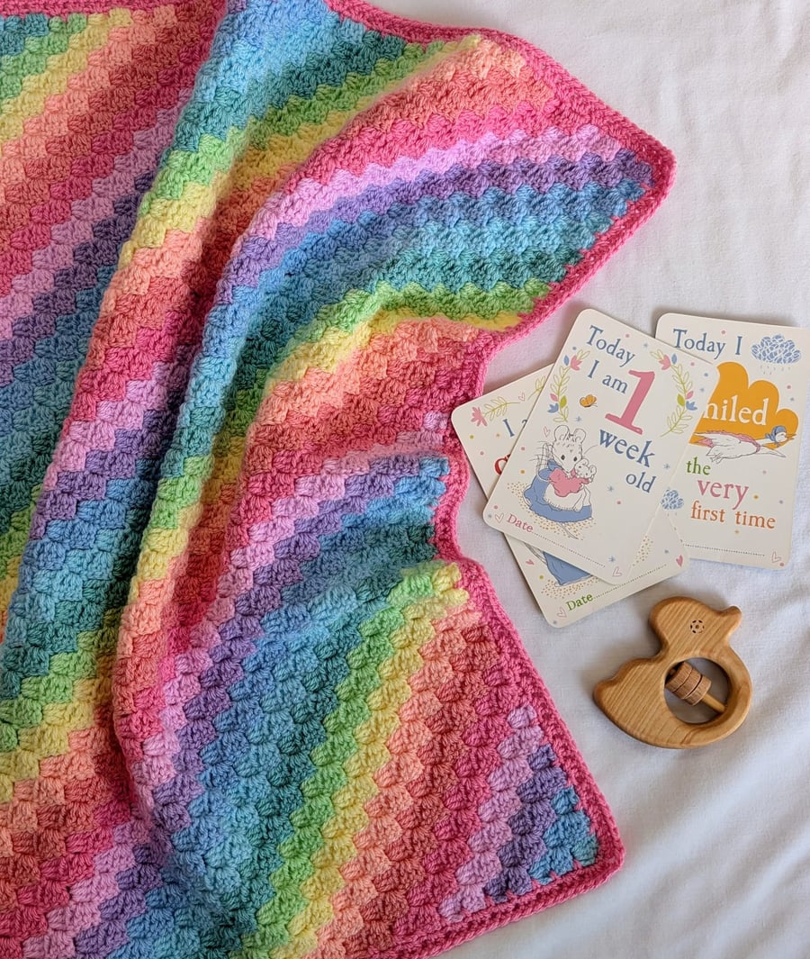 Handmade rainbow crochet baby blanket