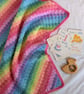 Handmade rainbow crochet baby blanket
