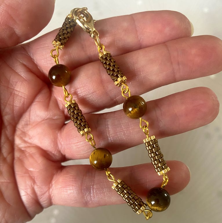 Artisan beaded bracelet with tiger's eye gemstone and gold accents 