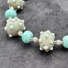 mint green and cream bumpy lampwork glass beaded necklace