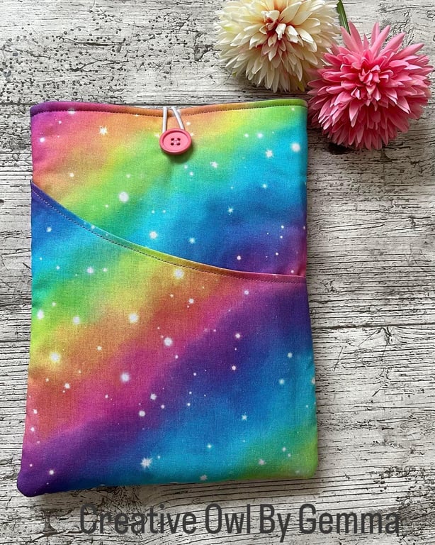 Fabric book sleeve with pocket for paperback books. Padded and fully lined. Hand