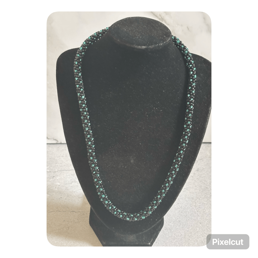 Black and turquoise polka dot beaded kumihimo necklace 