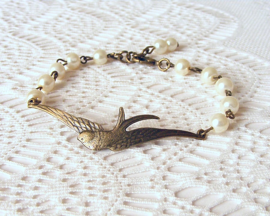 Beaded Bracelet with Bird Connector and Pearls