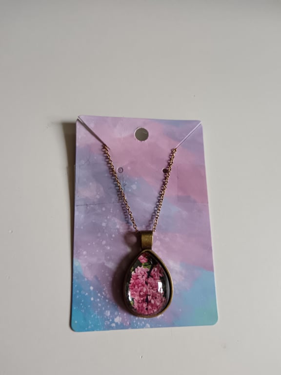 Pink flowers in bloom teardrop photography necklace 