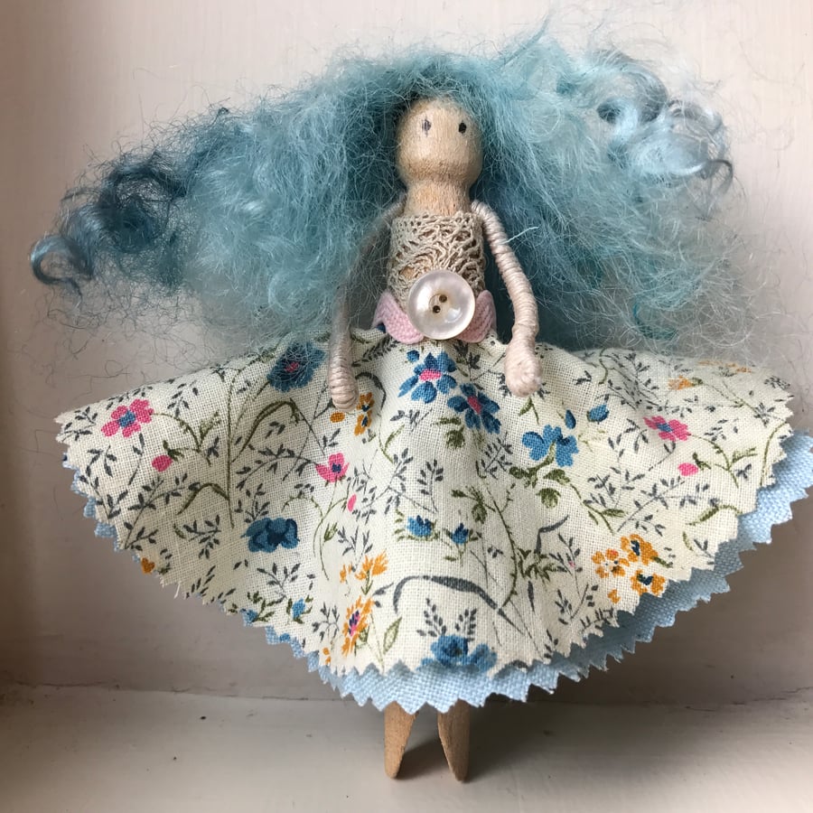 Peg doll with ditsy dress and vintage lace