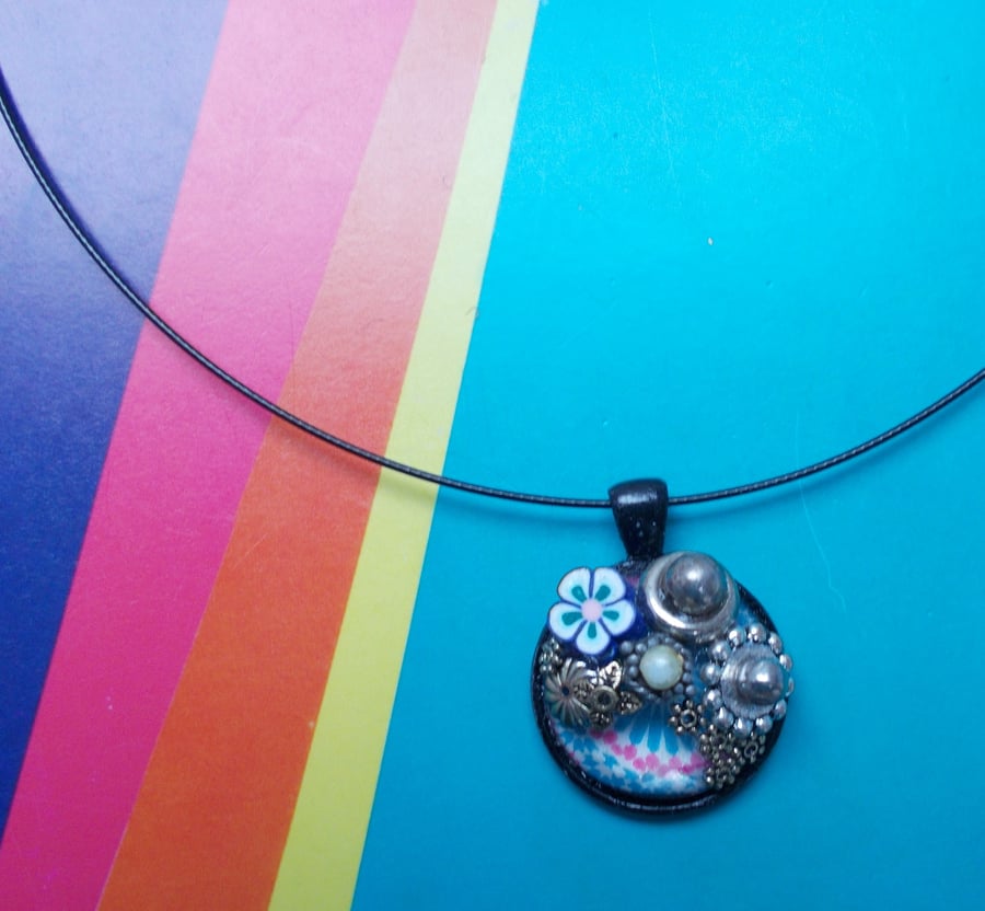 A Glass Cabochon Pendant Embellished with Pretty Recycled Beads