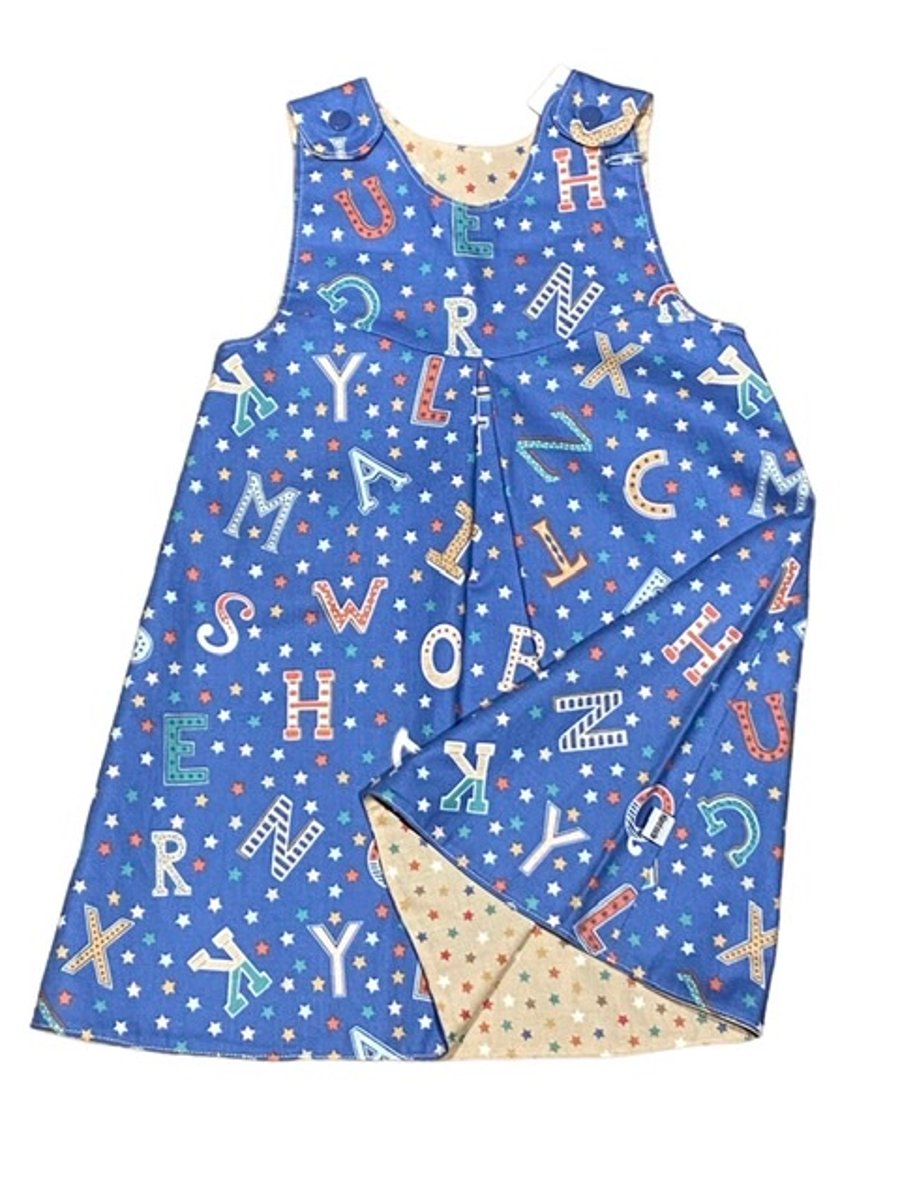 Letters and Stars Reversible Pinafore Dress - 12-18 months