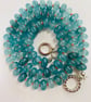 Teal blue cracked glass rondelle hand knotted necklace 