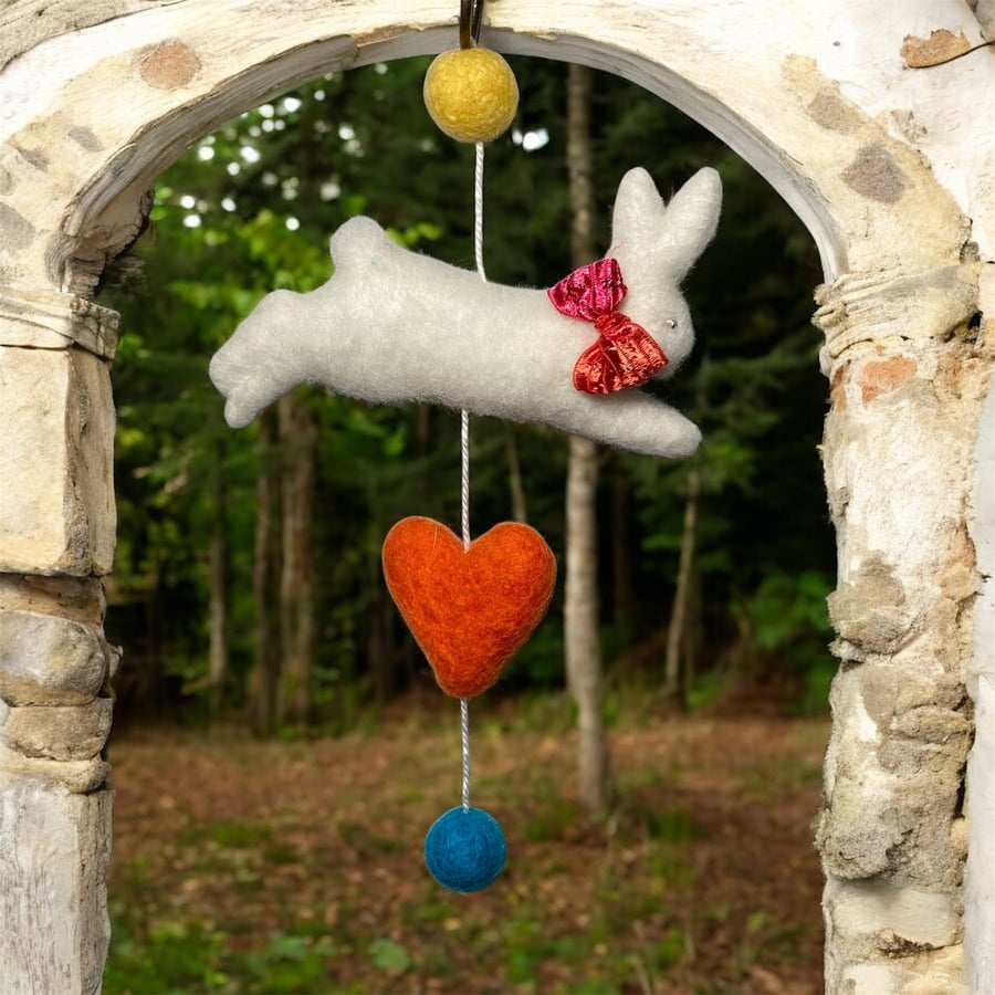 Leaping bunny, felted hanging with coloured felt balls and heart (red ribbon)