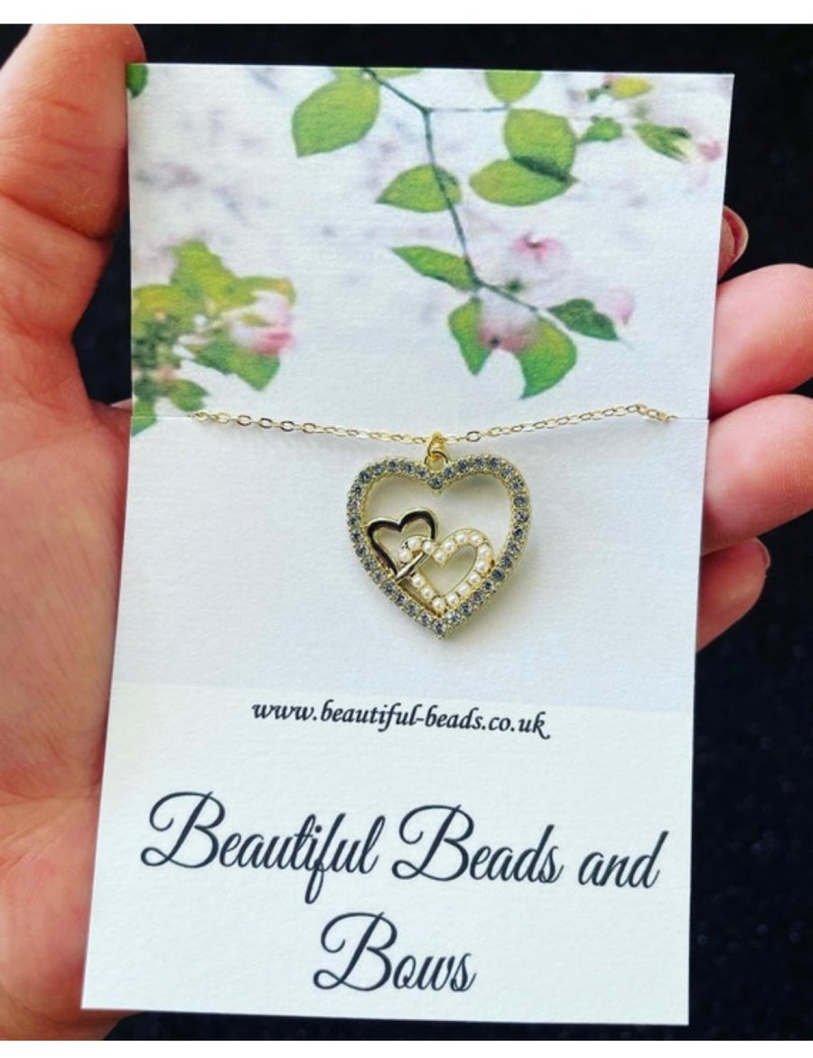 Goldtone triple heart charm pendant necklace 16 inches rhinestone heart necklace