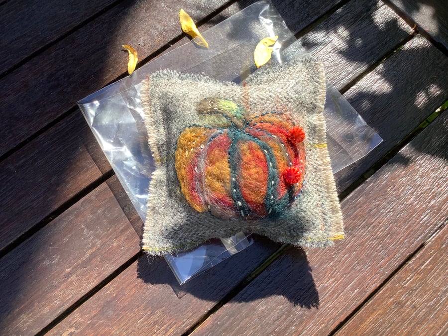 Pumpkin pincushion.Hand made ,one of a kind, original felting with stitches.