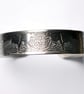 Steel wolf bracelet with celtic knot detail - Image 2
