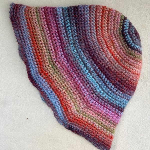 Multicoloured hand crocheted hat.