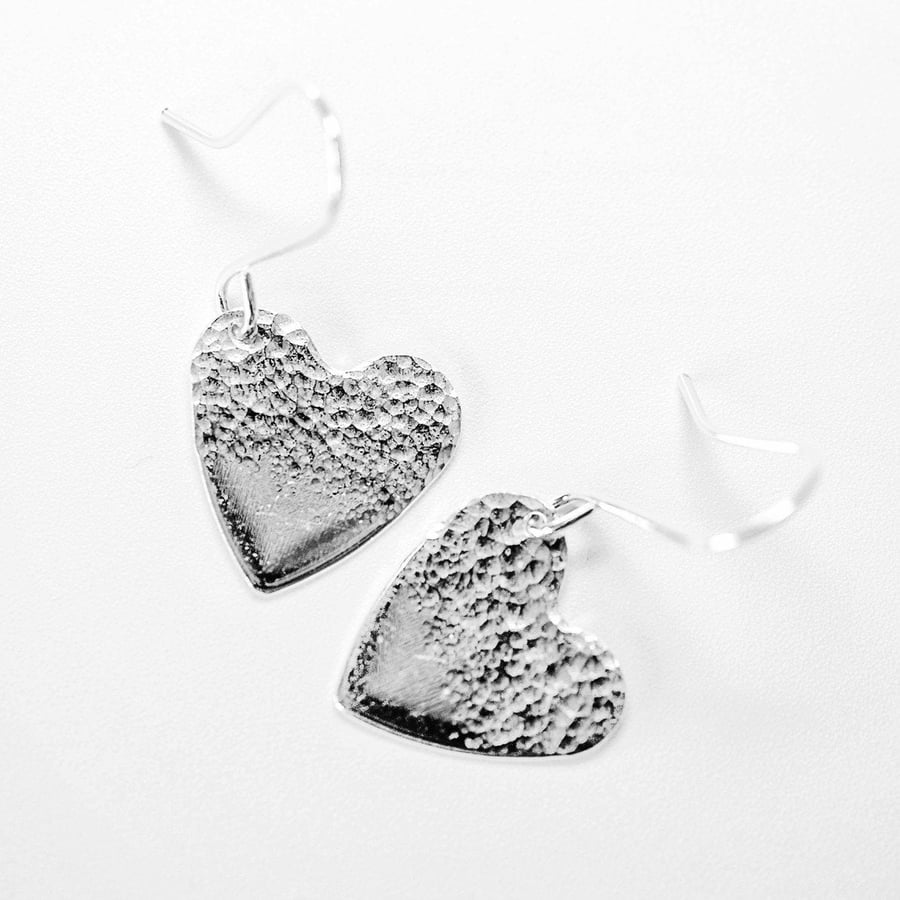 Silver earrings - Sterling silver half hammered heart earrings