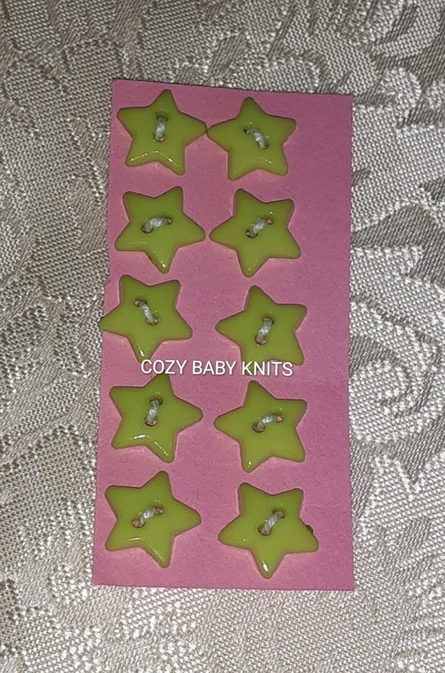 13MM PALE GREEN STAR PLASIC BUTTONS WITH TWO HOLES FOR ATTACHING 