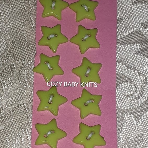 Pale green star plastic buttons