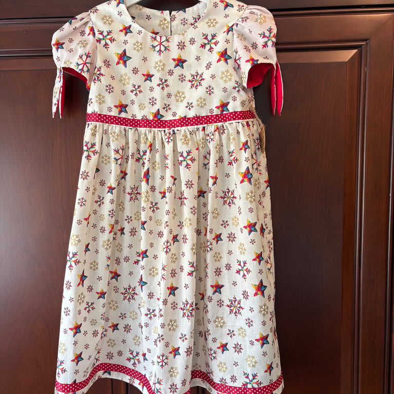 The Child's Rainbow Star Christmas Dress
