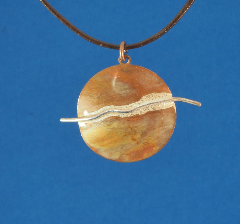 Long Wave Circular Copper and Silver Pendant