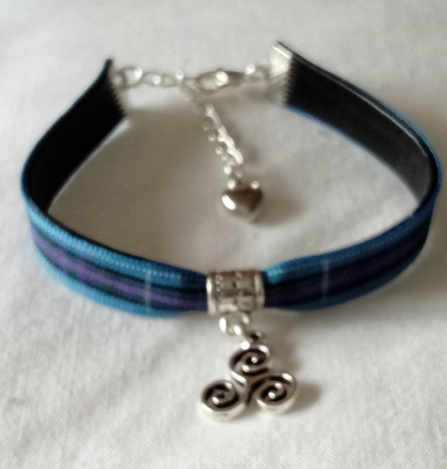 Celtic Triskelion Bracelet on a tartan ribbon band, handmade in Scotland