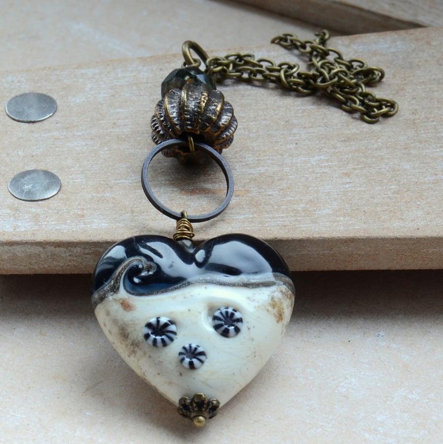 Lampwork Glass Cream and Blue Heart Necklace with Metal Urchin Bead