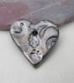Medium Metallic Silver Brocade Texture Heart Shaped Ceramic Pendant - Image 1